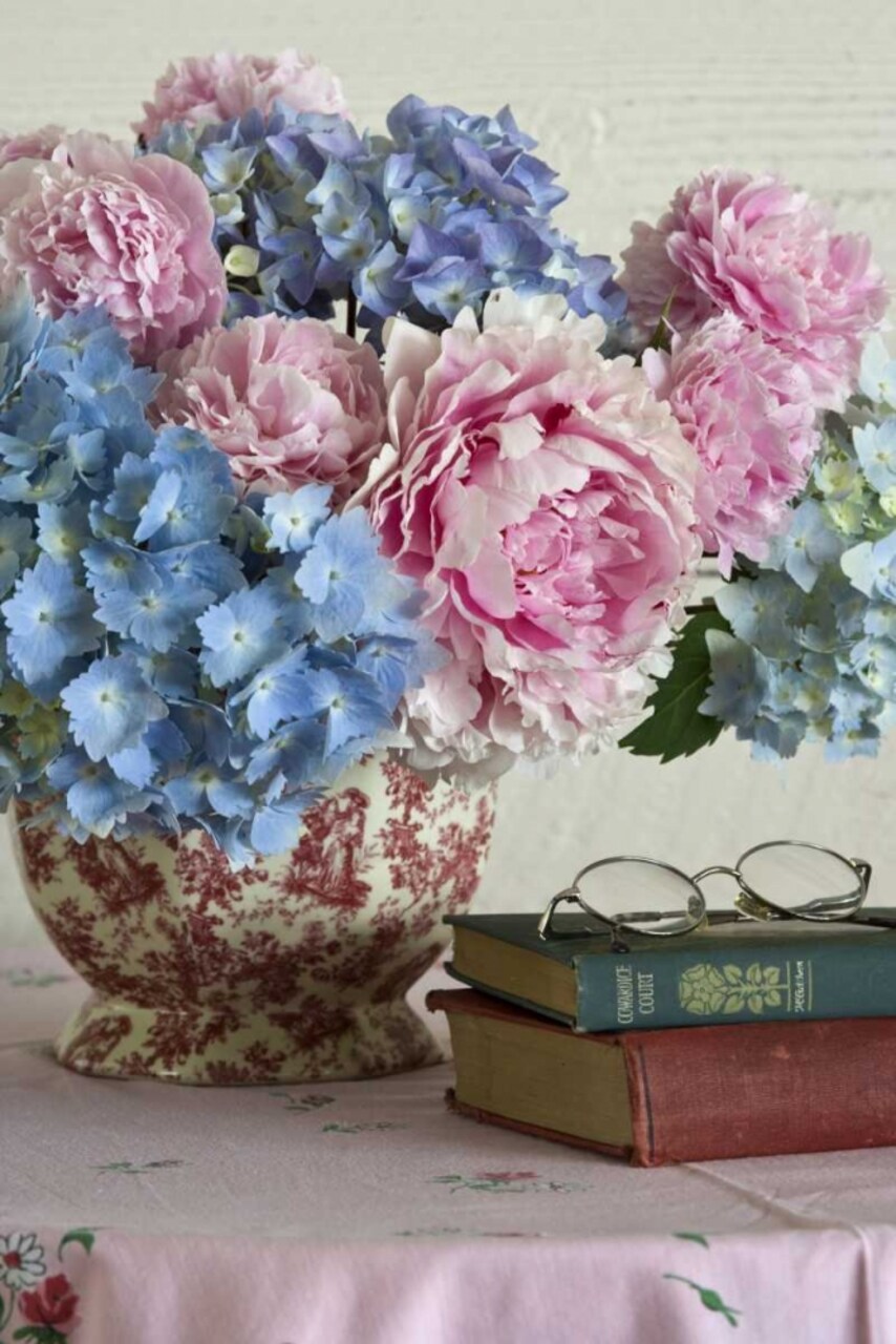 Hydrangea and peony arrangement on table by Don Paulson - Item # VARPDXLI08BJA0009